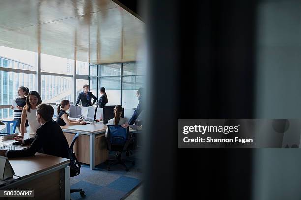 business people working in office - busy office stock pictures, royalty-free photos & images