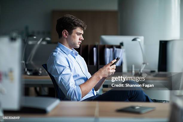 businessman working on phone - executive search bildbanksfoton och bilder