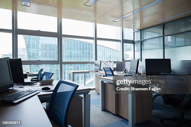 view of an empty office - office desk no people stock pictures, royalty-free photos & images