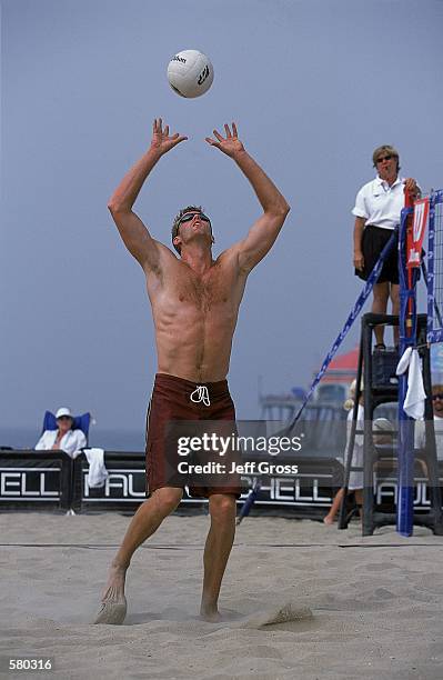 Jeff Nygaard sets the ball during the AVP Huntington Beach Open at the Huntington Pier in Huntington Beach, California.Mandatory Credit: Jeff Gross...