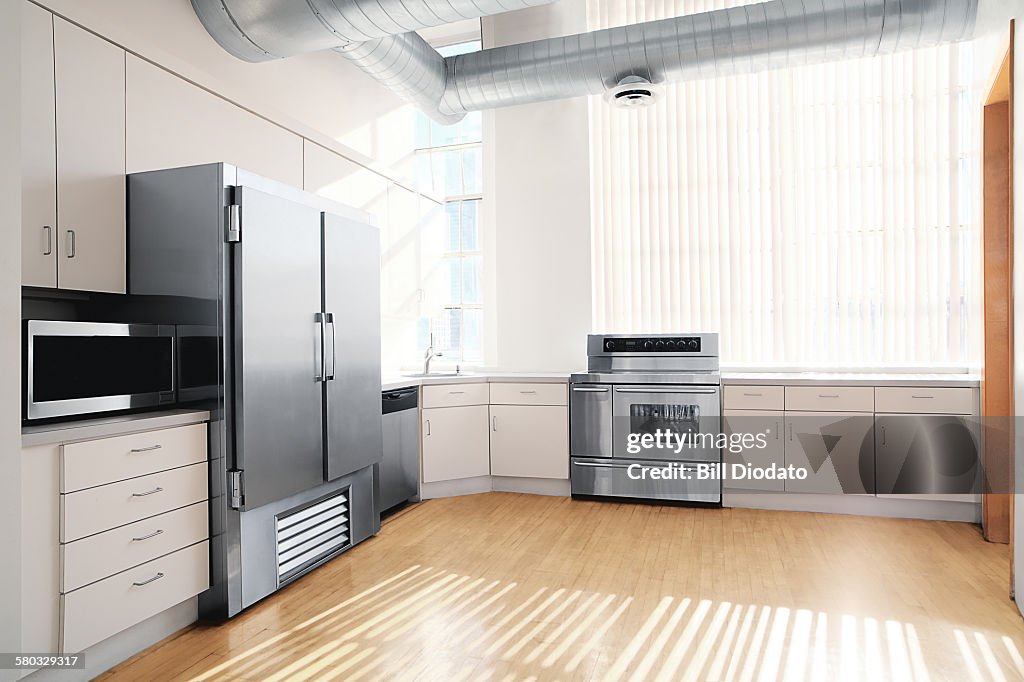 Sunlit kitchen interior one