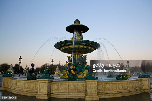fontaines de la concorde at sunrise - fontaine des mers stock pictures, royalty-free photos & images