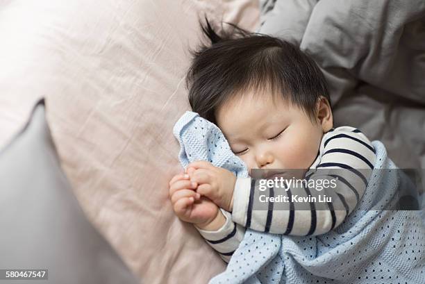 sleeping baby boy - asian sleeping stock pictures, royalty-free photos & images