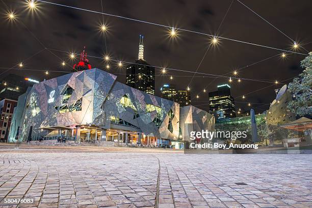 federation square, melbourne, victoria, australia - nightlife stock pictures, royalty-free photos & images
