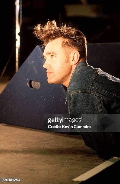 English singer Morrissey leaning on a stage, Dublin, 27th April 1991.
