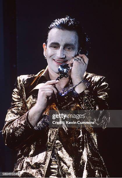 Singer Bono, in his stage persona of Mr. MacPhisto, during a concert by Irish rock group U2 on their 'Zoo TV' tour, 1992.