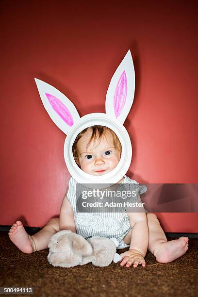 caucasian baby girl wearing easter bunny costume - easter bunny mask fotografías e imágenes de stock