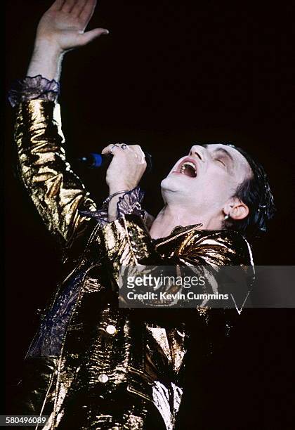 Singer Bono, in his stage persona of Mr. MacPhisto, during a concert by Irish rock group U2 on their 'Zoo TV' tour, 1992.