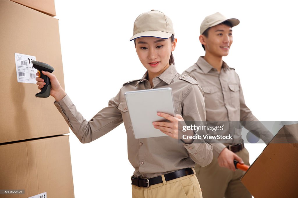 Young woman and young man in warehouse