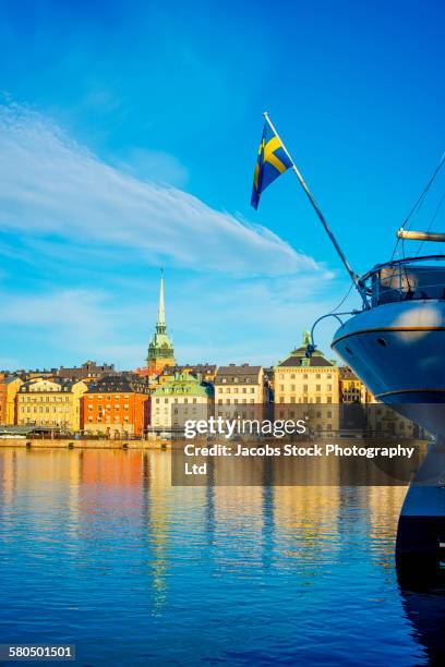 buildings and boat in harbor in stockholm cityscape, stockholm, sweden - stockholm old town stock pictures, royalty-free photos & images