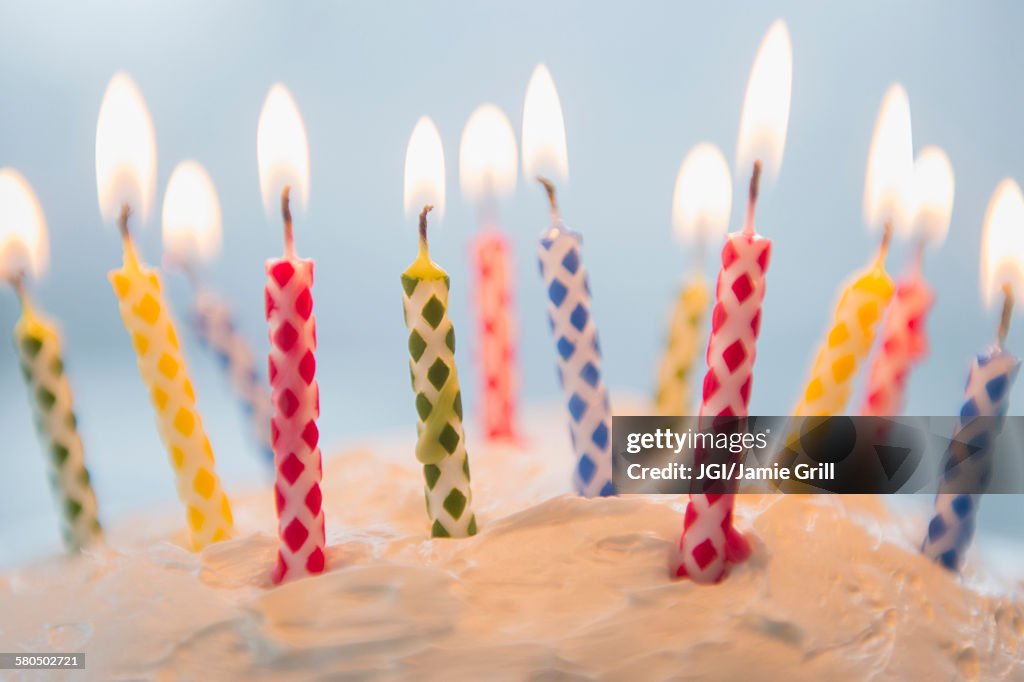 Close up of birthday candles in cake