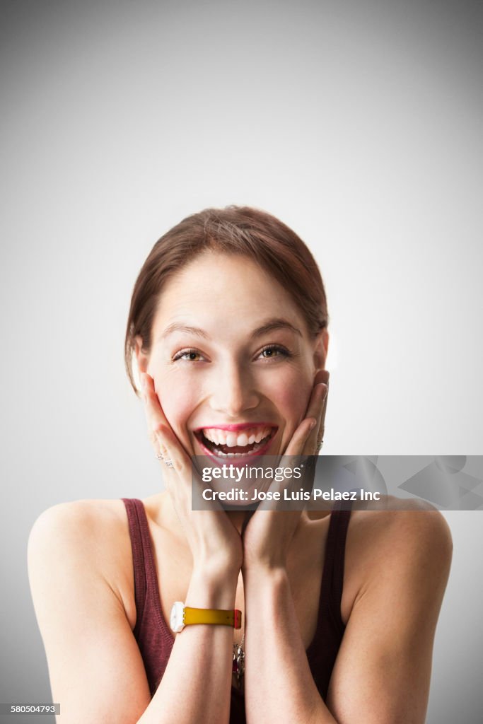 Close up of surprised Caucasian woman gasping