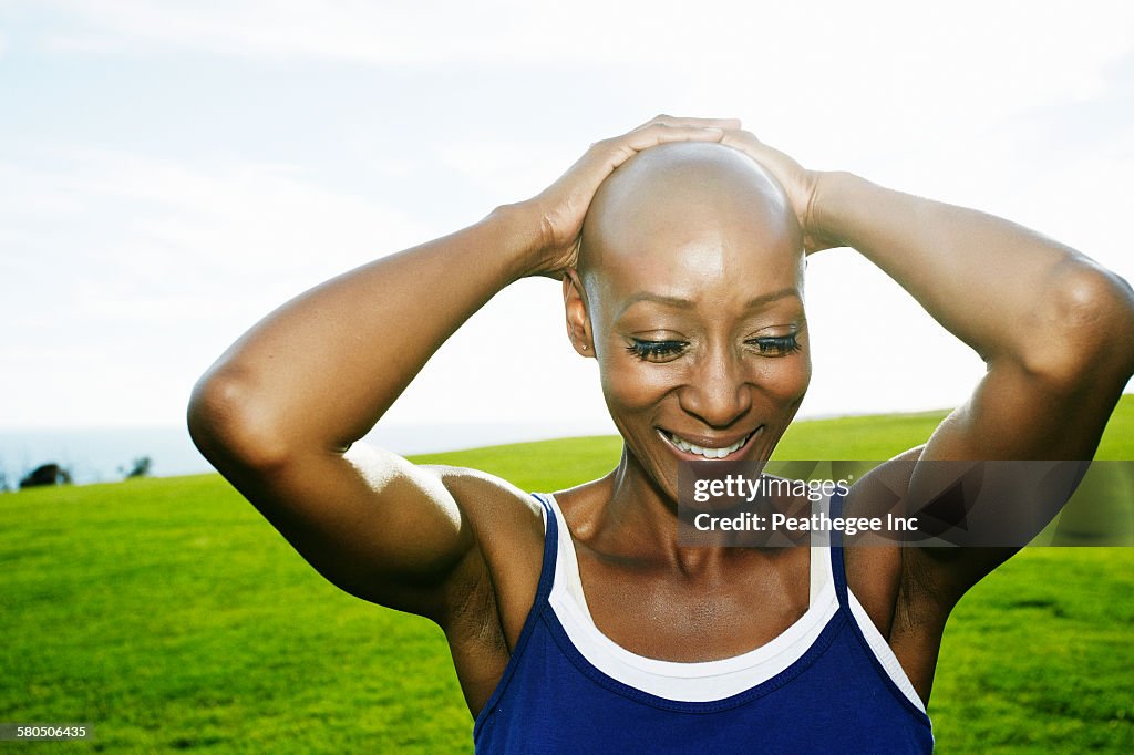 African American woman smiling in park