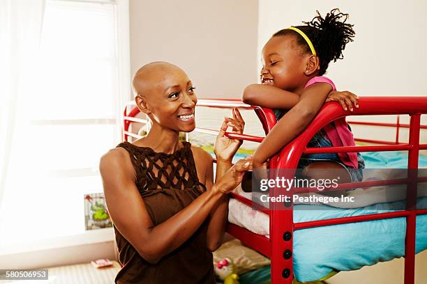 black mother and daughter talking in bedroom - kids in bunk bed stock pictures, royalty-free photos & images