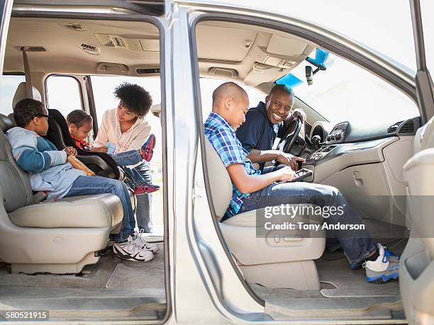 family of five preparing for road trip - car safety kids road stock pictures, royalty-free photos & images