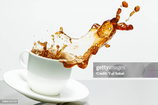 jump out coffee - coffee splash stock pictures, royalty-free photos & images