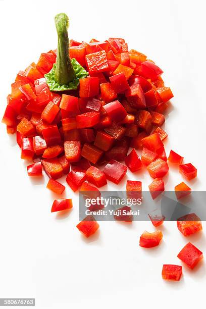 dice formed red  bell pepper forming - red bell pepper fotografías e imágenes de stock