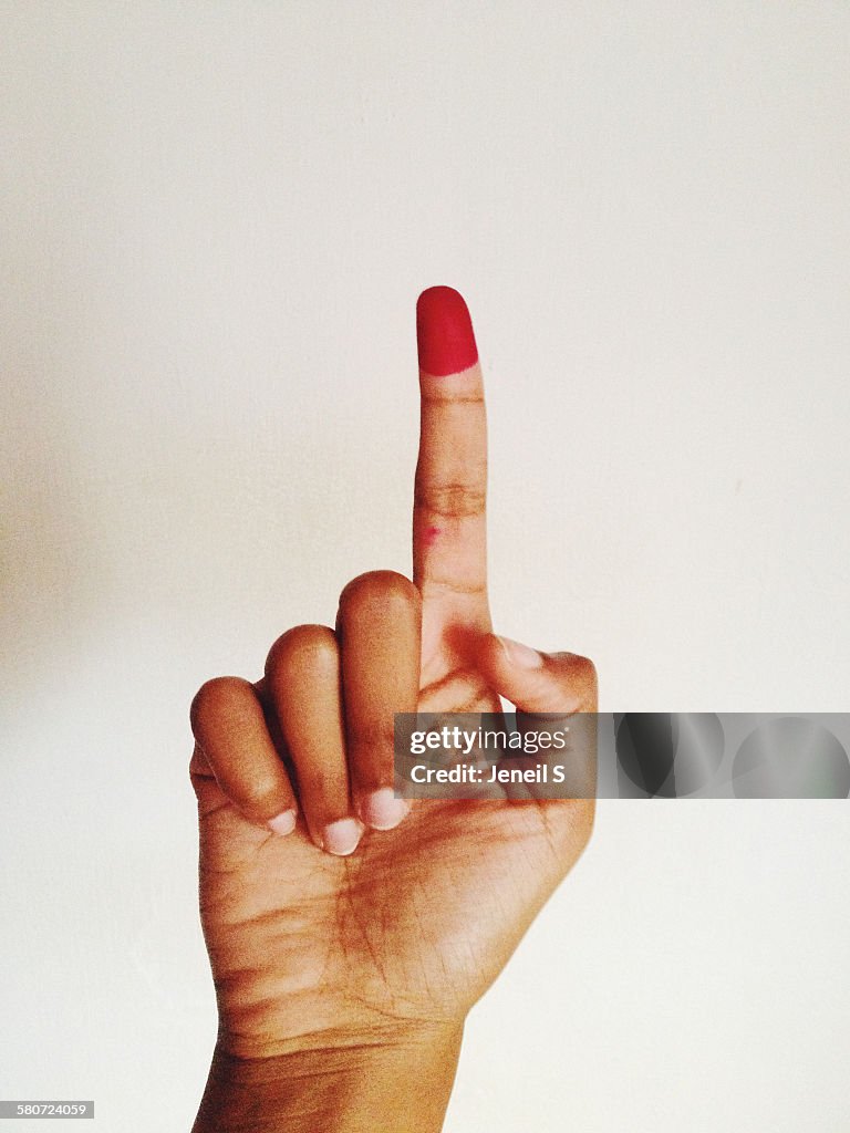 The stained finger of a voter