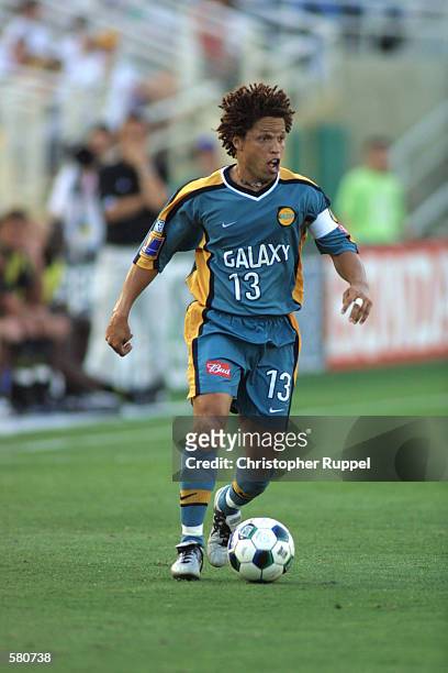 Cobi Jones of the Los Angeles Galaxy dribbles down field during the match against the Columbus Crew at the Rose Bowl in Pasadena, California. The...