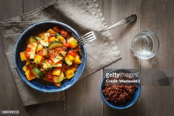 ratatouille with red wholegrain rice - ratatouille stock pictures, royalty-free photos & images