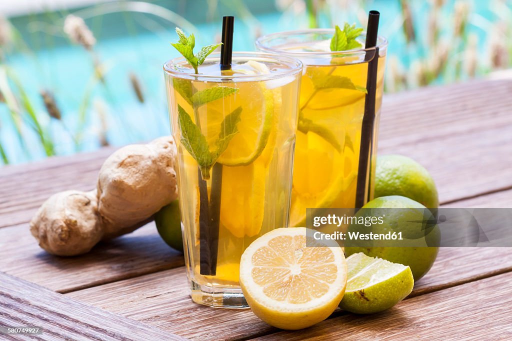 Homemade iced tea, lemonade with fresh ginger, lemon, lime and mint