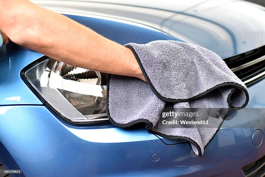 Man polishing car