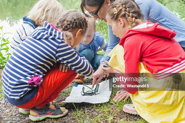 Children Using Compass Compass On Watch Photos and Premium High Res Pictures - Getty Images