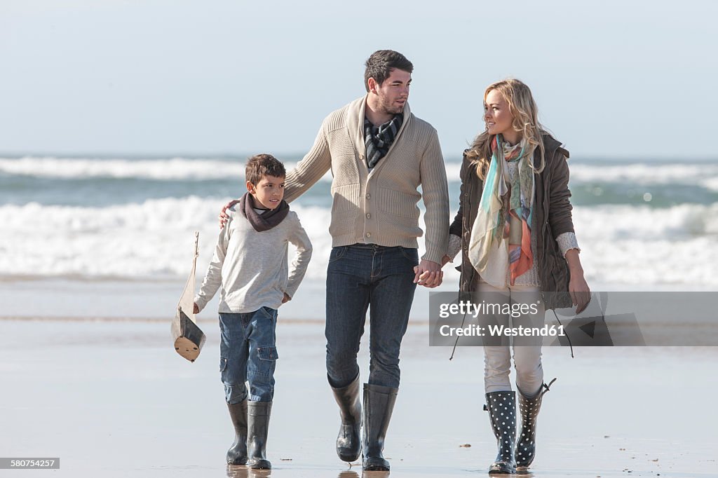 South Africa, Witsand, family walking on the beach