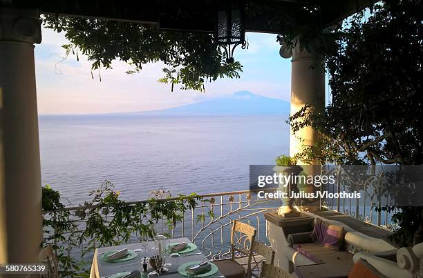 terrace view of the bay of naples and vesuvius - sorrento italy photos et images de collection