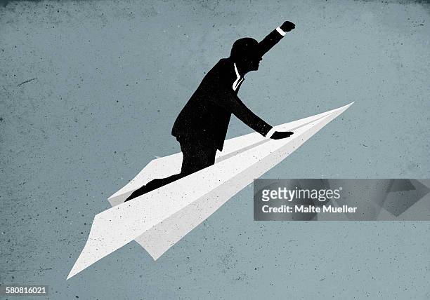 illustrative image of businessman flying on paper plane - freedom stock-grafiken, -clipart, -cartoons und -symbole