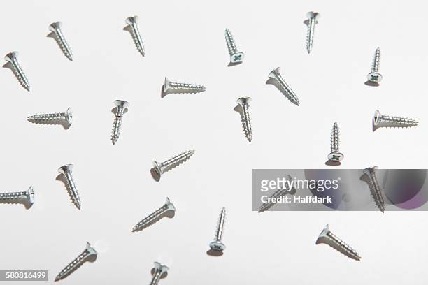 screws on white background - screw stock pictures, royalty-free photos & images