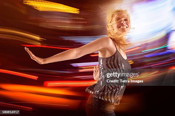 usa, new jersey, woman dancing in club - long exposure dance stock pictures, royalty-free photos & images