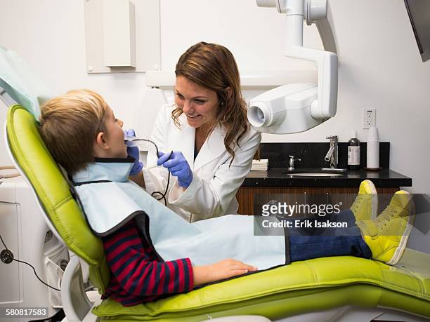 usa, california, ladera ranch, dentist and patient (8-9) in dentists office - 小児歯科 ストックフォトと画像