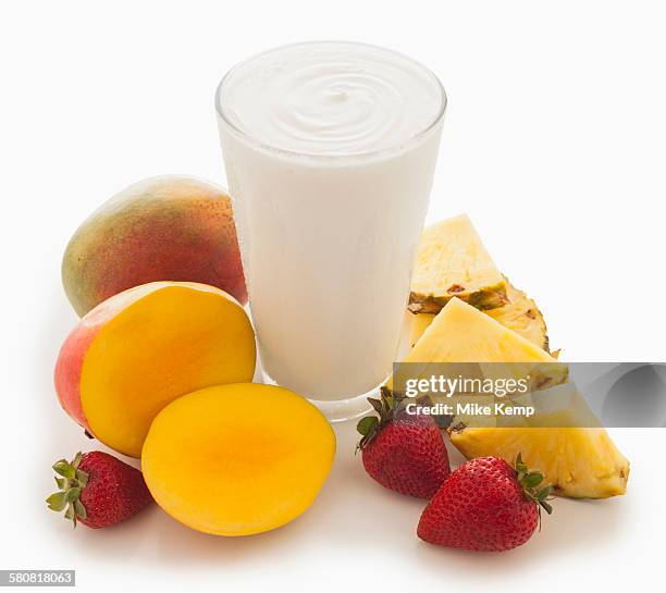 pineapple, mango and strawberry smoothie - mango smoothie stock pictures, royalty-free photos & images