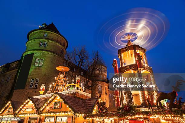 germany, baden-wurttemberg, stuttgart, christmas market at night - christmas stuttgart stock pictures, royalty-free photos & images