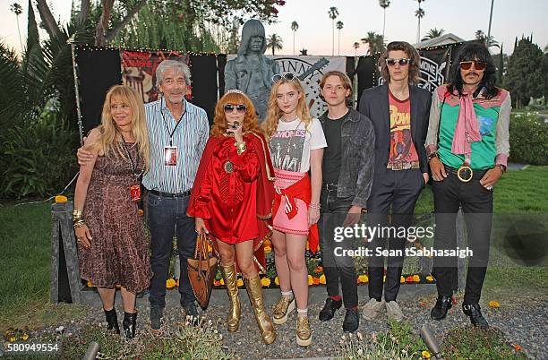 Linda Ramone poses with actress Rosanna Arquette and husband Todd Morgan, actress Katherine Newton, actor Jack Kilmer, model Dylan Brosnan and...