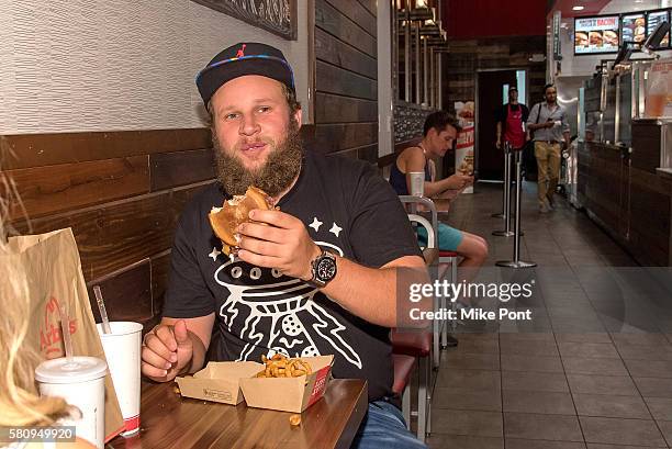 Professional golfer Andrew "Beef" Johnston visits Arby's on July 23, 2016 in New York City.