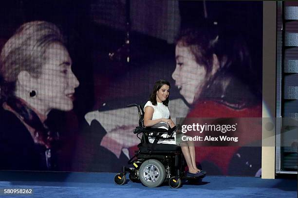 Anastasia Somoza, an international disability rights advocate, arrives on stage to deliver remarks on the first day of the Democratic National...