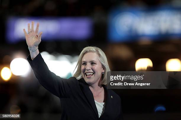 Sen. Kirsten Gillibrand walks on stage to deliver remarks on the first day of the Democratic National Convention at the Wells Fargo Center, July 25,...