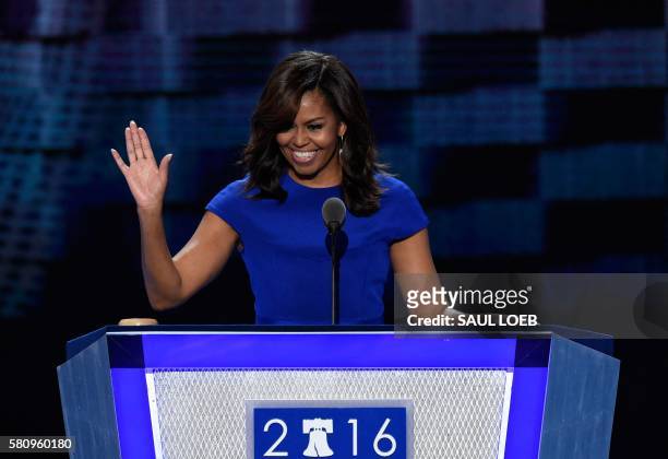 First Lady Michelle Obama gestures during Day 1 of the Democratic National Convention at the Wells Fargo Center in Philadelphia, Pennsylvania, July...