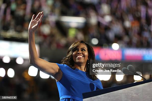 First lady Michelle Obama acknowledges the crowd before delivering remarks on the first day of the Democratic National Convention at the Wells Fargo...