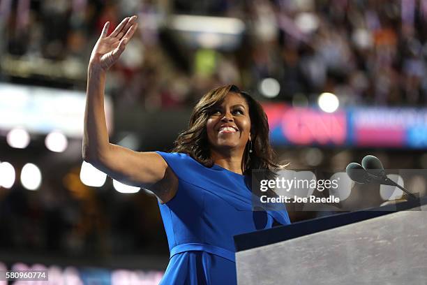 First lady Michelle Obama acknowledges the crowd after delivering remarks on the first day of the Democratic National Convention at the Wells Fargo...