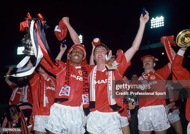 Manchester United's Paul Ince celebrates with Steve Bruce after their victory in the FA Cup Final replay against Crystal Palace at Wembley Stadium on...