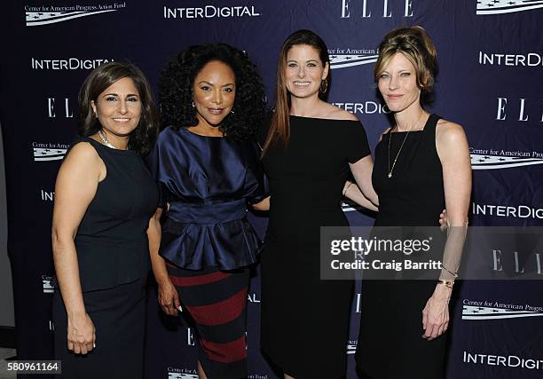 Neera Tanden, Lynn Whitfield, Debra Messing and Robbie Myers attend a reception hosted by ELLE Editor-in-Chief Robbie Myers and Center for American...