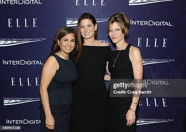 Neera Tanden, Debra Messing and Robbie Myers attend a reception hosted by ELLE Editor-in-Chief Robbie Myers and Center for American Progress...