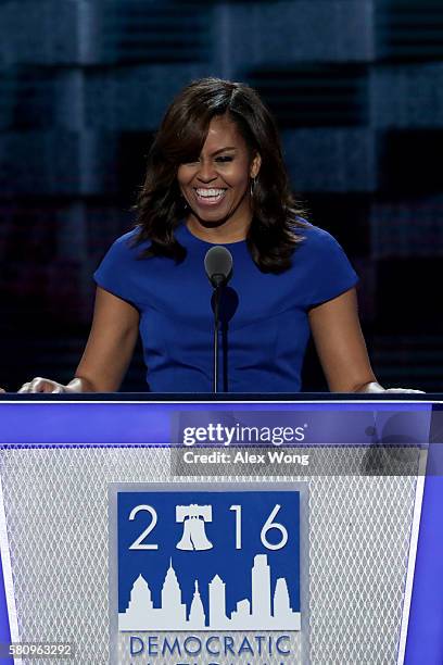 First lady Michelle Obama delivers remarks on the first day of the Democratic National Convention at the Wells Fargo Center, July 25, 2016 in...