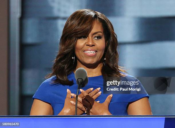 First lady Michelle Obama delivers remarks on the first day of the Democratic National Convention at the Wells Fargo Center, July 25, 2016 in...