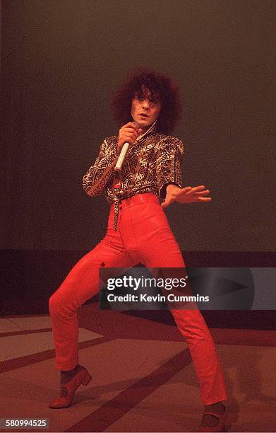 British singer, songwriter and musician Marc Bolan performing, circa 1977.