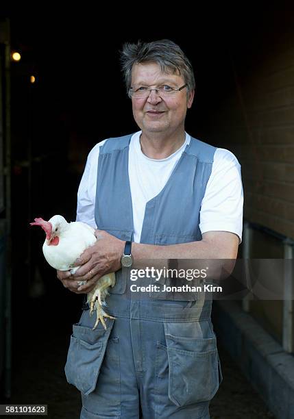 organic egg farmer portrait. - somero photos et images de collection