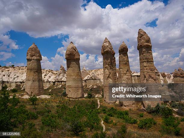 rock formations in love valley cappadocia turkey - forma de falo fotografías e imágenes de stock